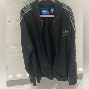 Adidas Black Jacket with Gold Accents